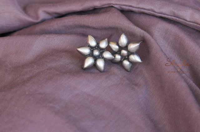 Moh Embossed Flower Studs