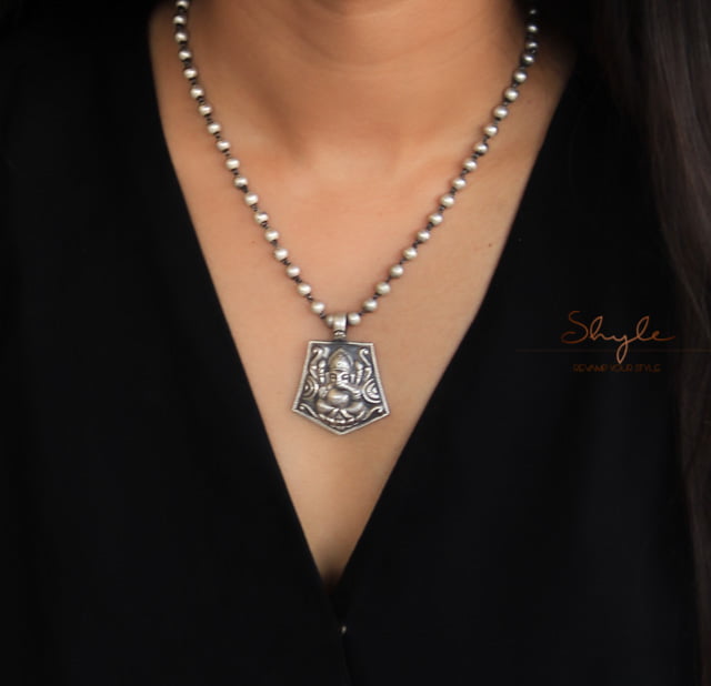 Moh Embossed Ganesha Ball Necklace