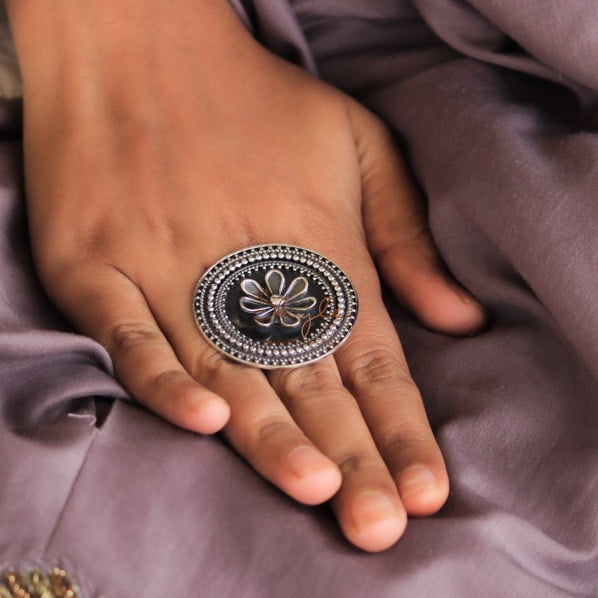 Anvaya sequence flower motif ring