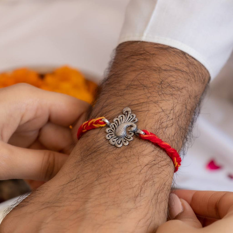 925 pure silver handcrafted dancing peacock rakhi