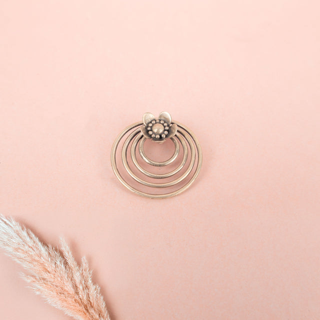 Moh Concentric Flower Embossed Pendant