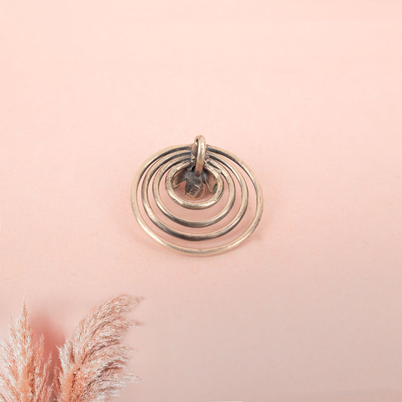 Moh Concentric Flower Embossed Pendant