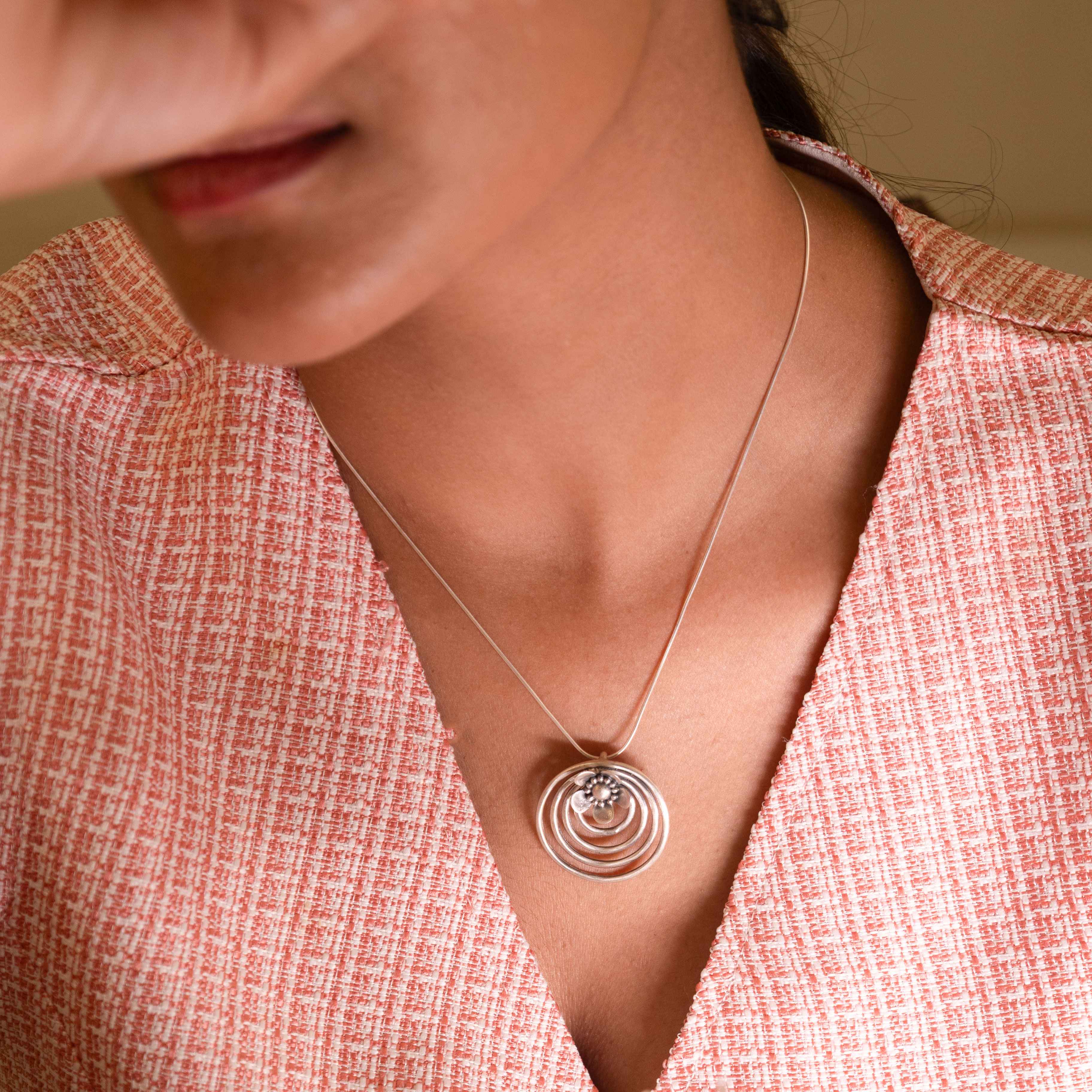 Moh Concentric Flower Embossed Pendant
