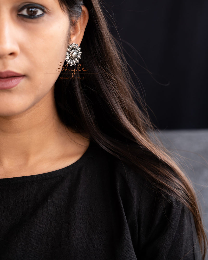 Moh Embossed Flower Studs model