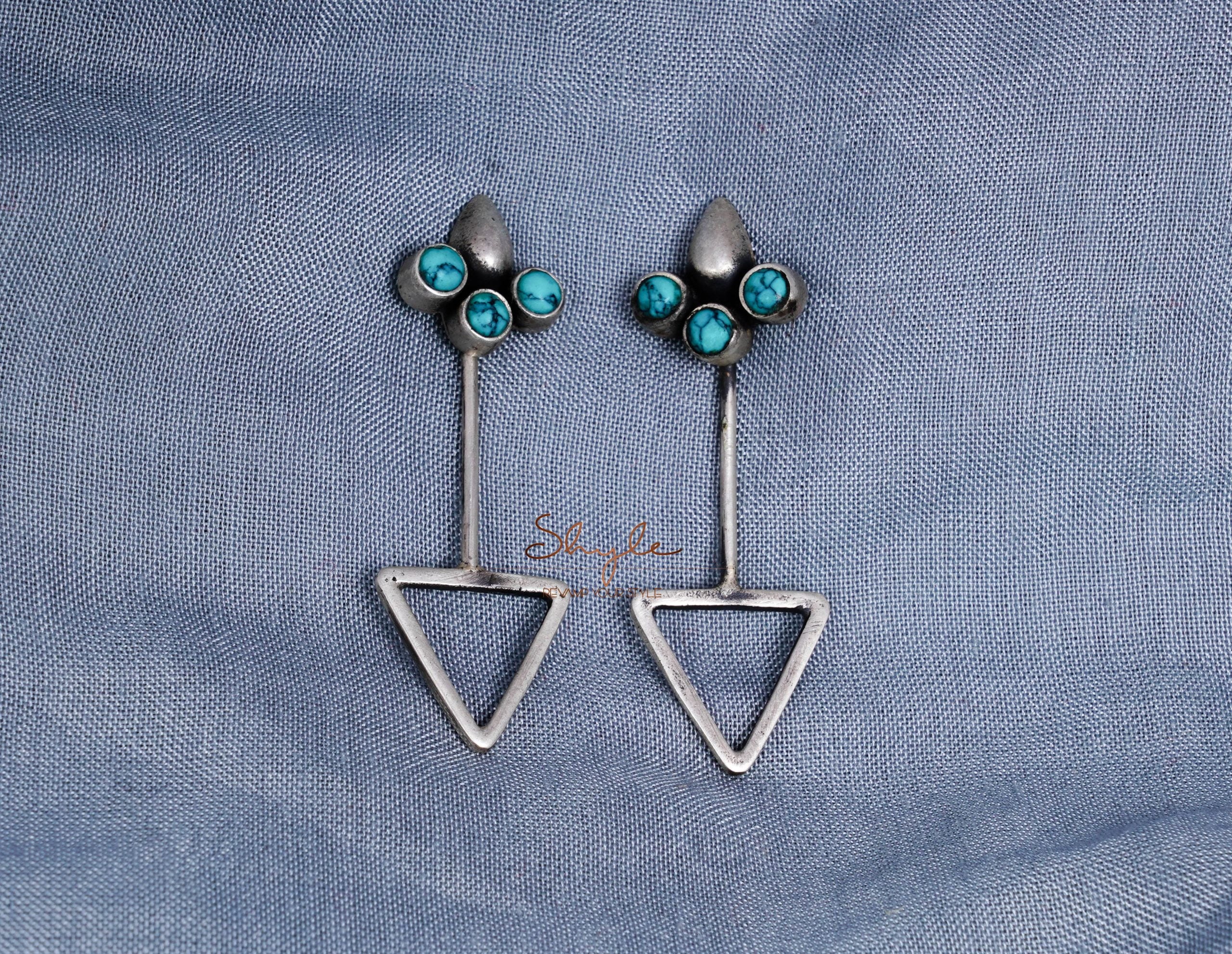 Moh Fine Triangle Drop motif studs front