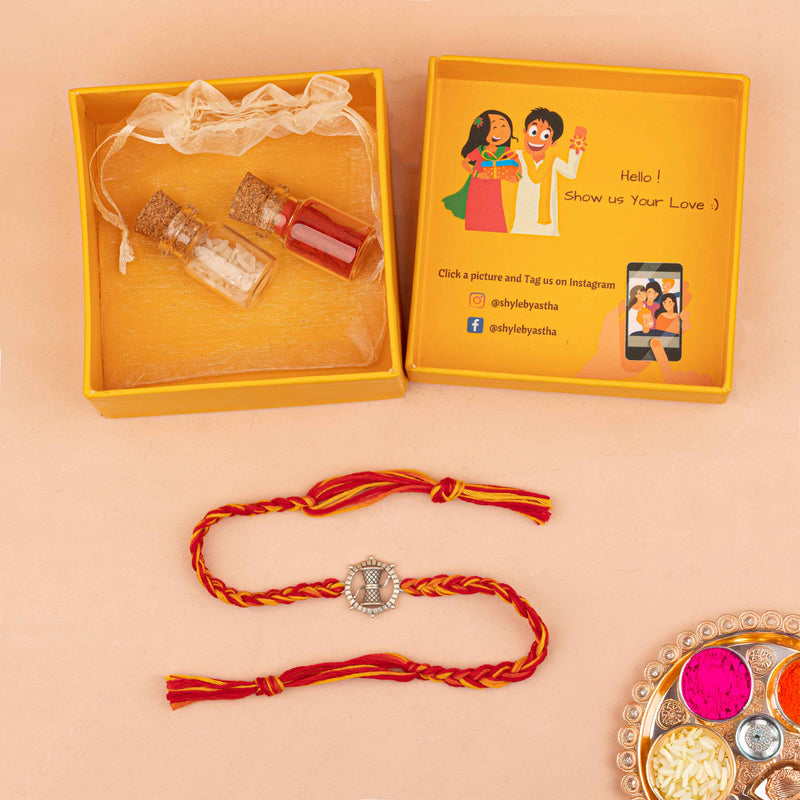 925 pure silver Shiva damru Mahadev rakhi, close-up