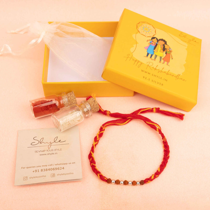 925 pure silver rudraksha and silver bead sutra rakhi, close-up