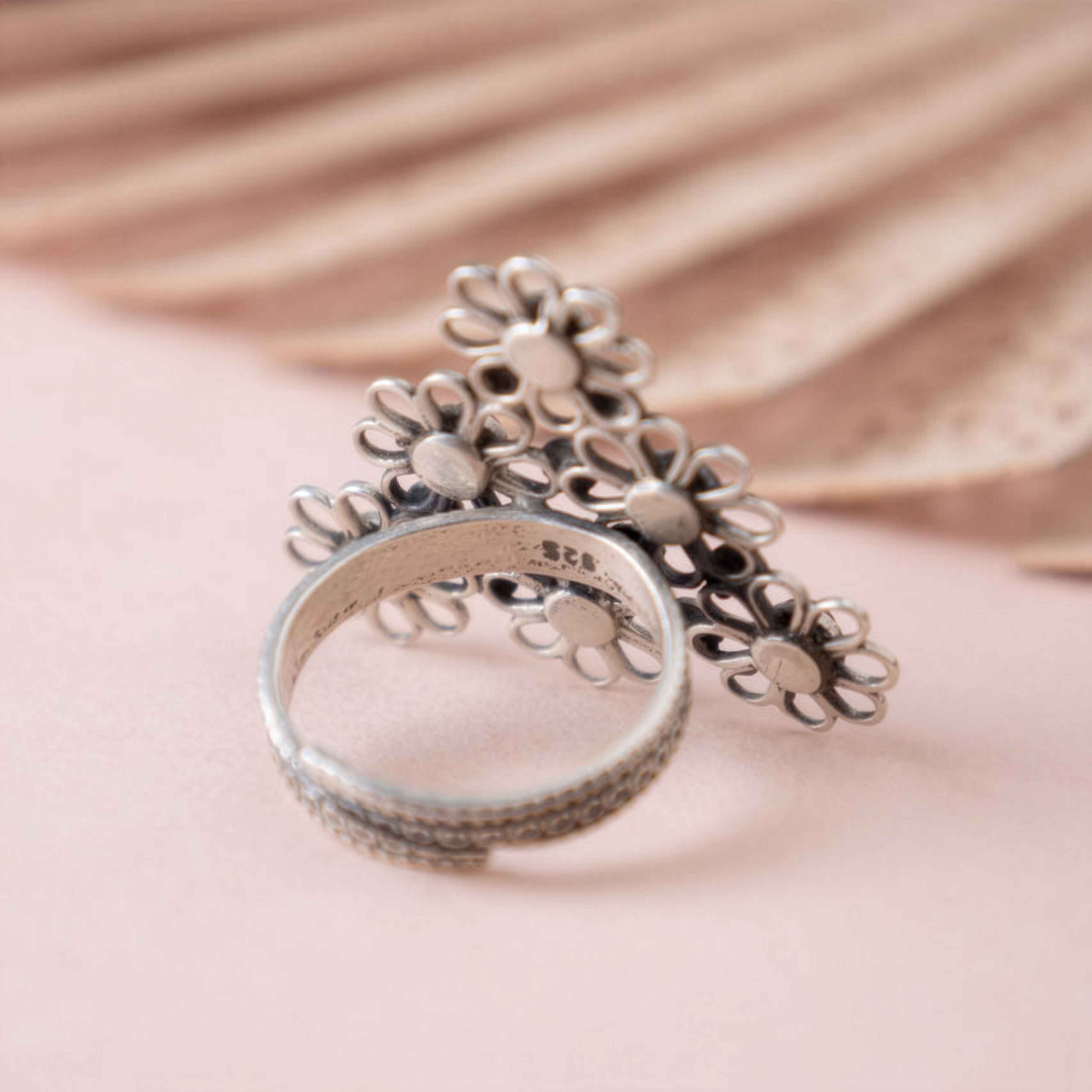 Tattva Carved flower statement green ring