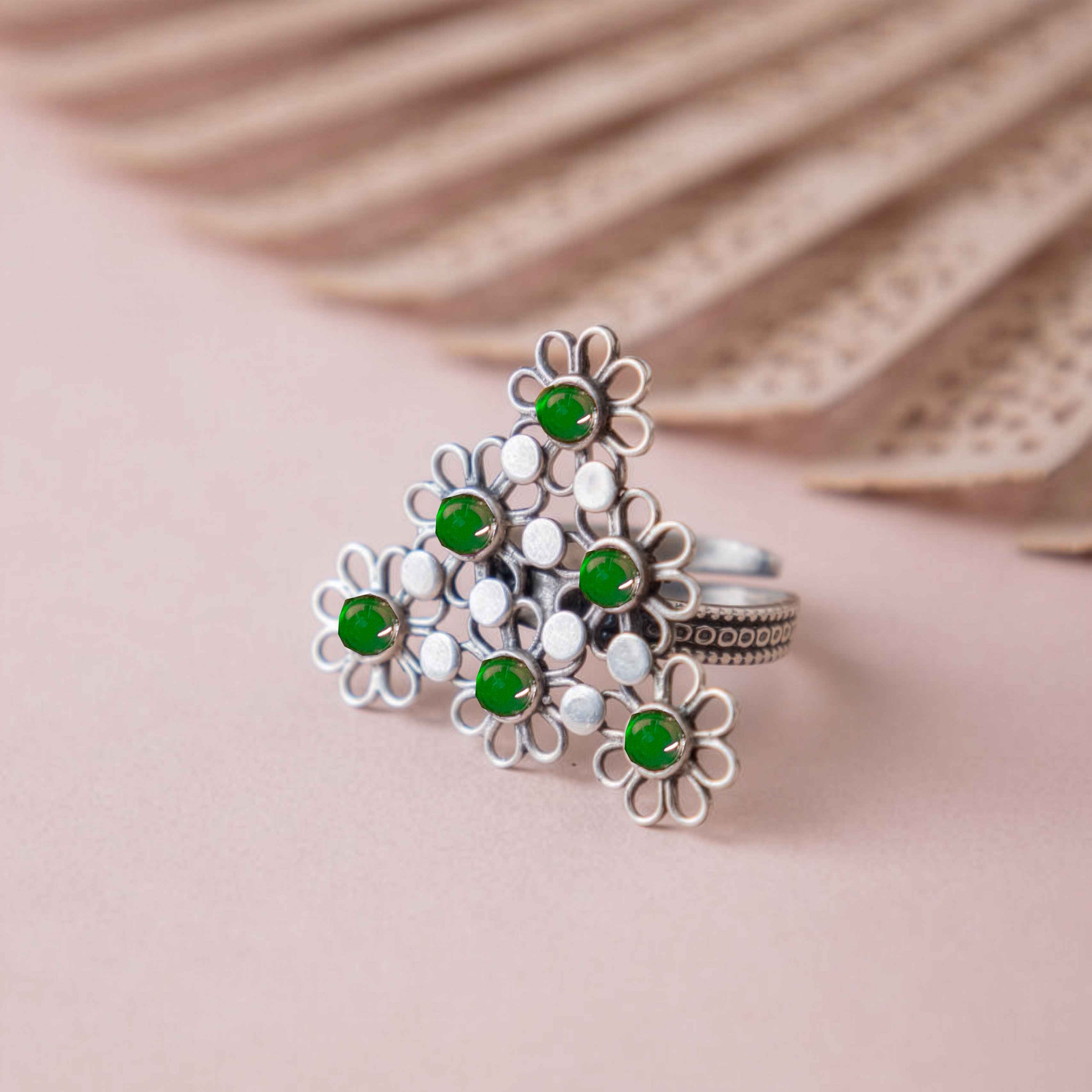 Tattva Carved flower statement green ring