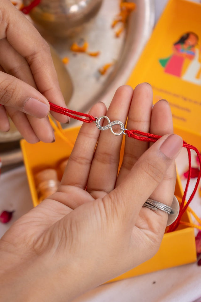 925 pure silver infinity knot rakhi, detail view