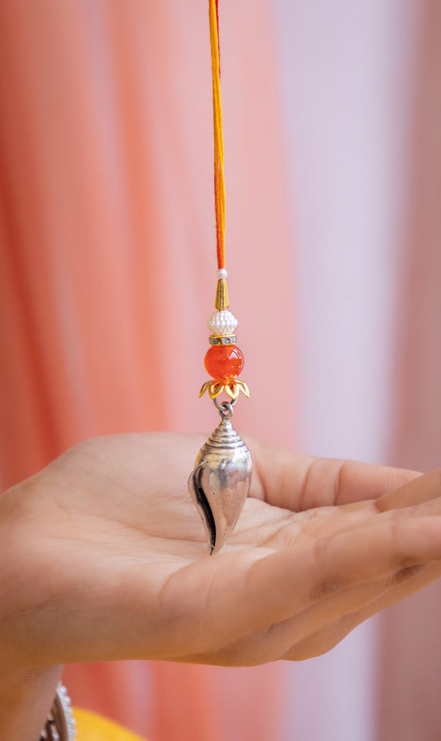 Adya  Shankha Pendant Lumba Rakhi
