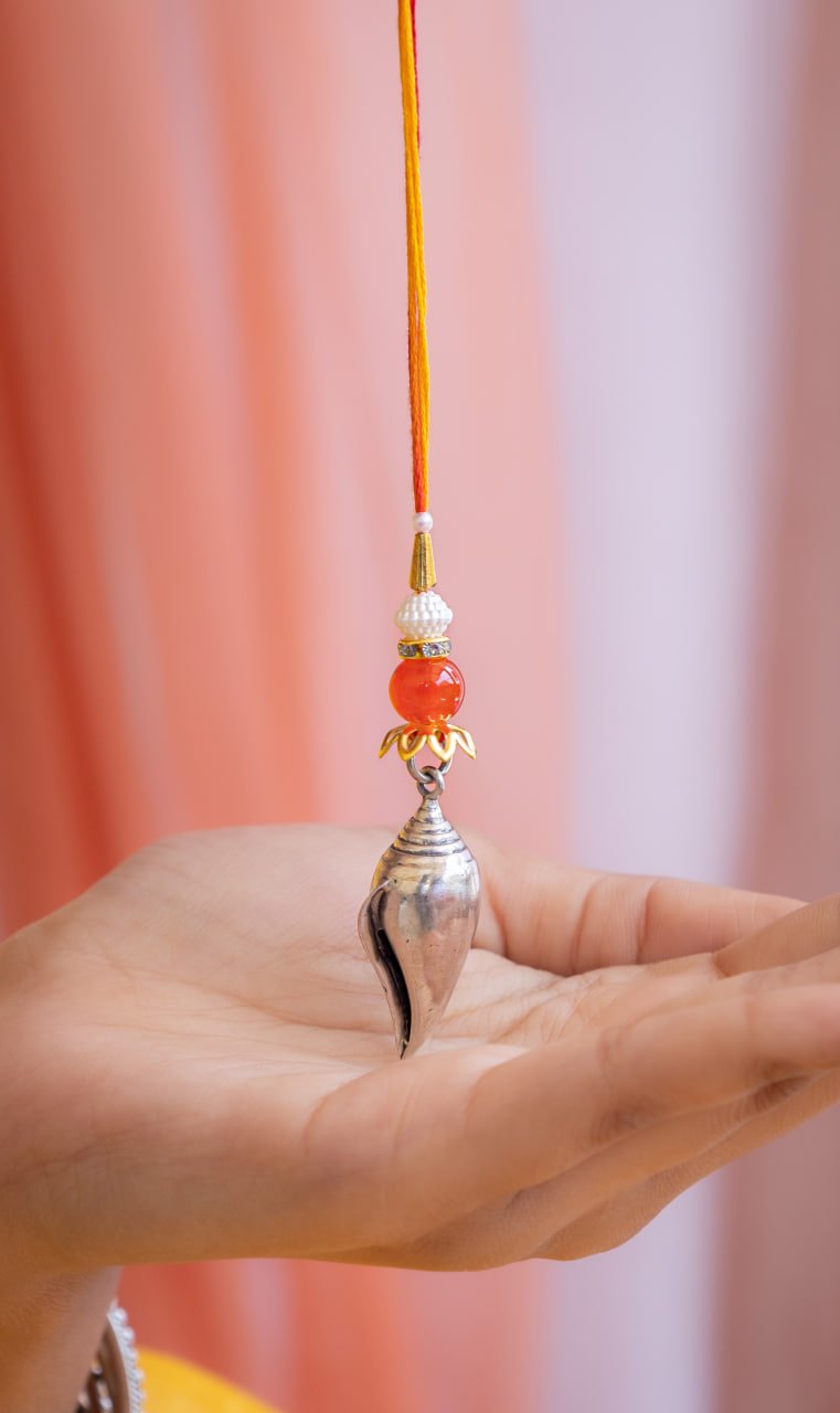 Adya  Shankha Pendant Lumba Rakhi