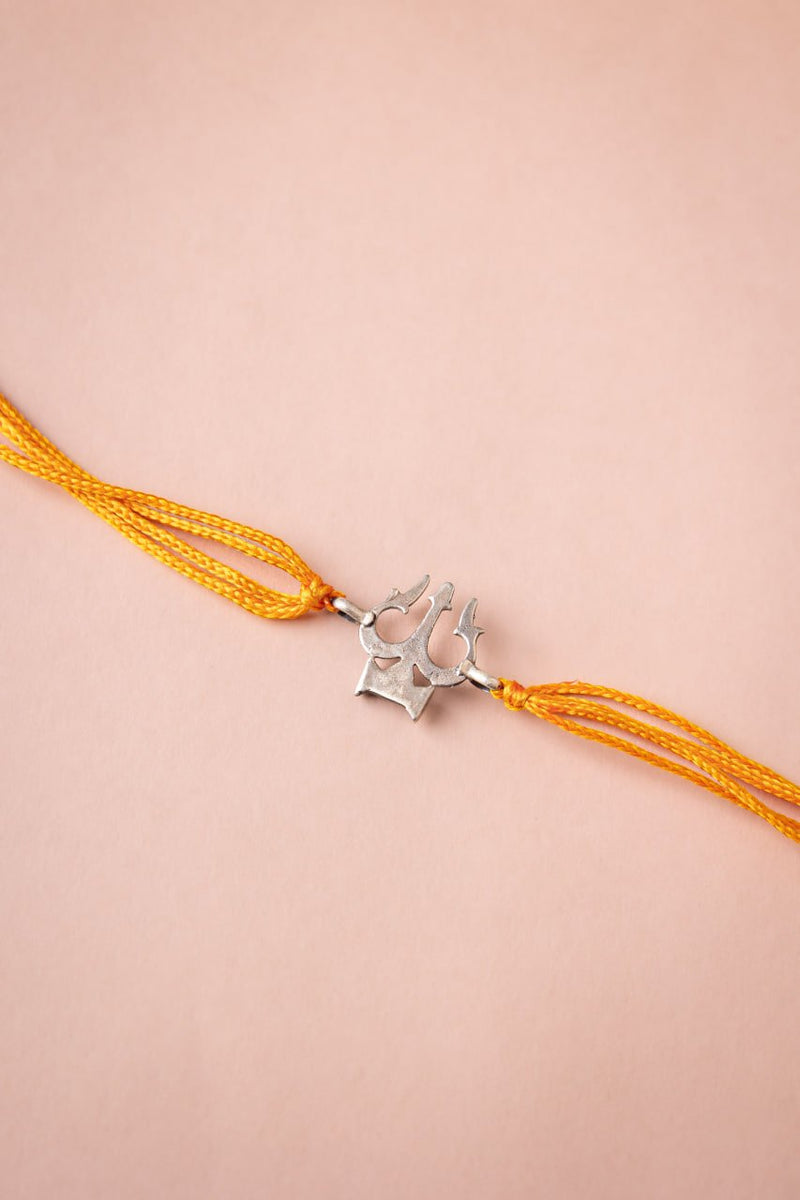 925 pure silver intricate Shiva trishul rakhi, side view