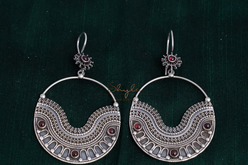 Mizoya Daana Detailed quirky fish hook earrings front