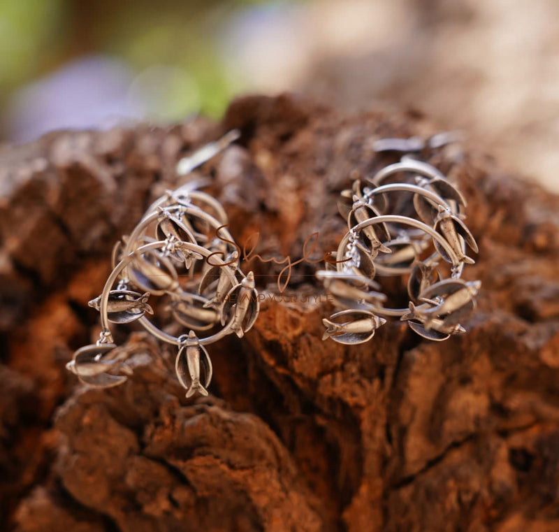Qurbat Flying Birds Spiral Statement Earring down
