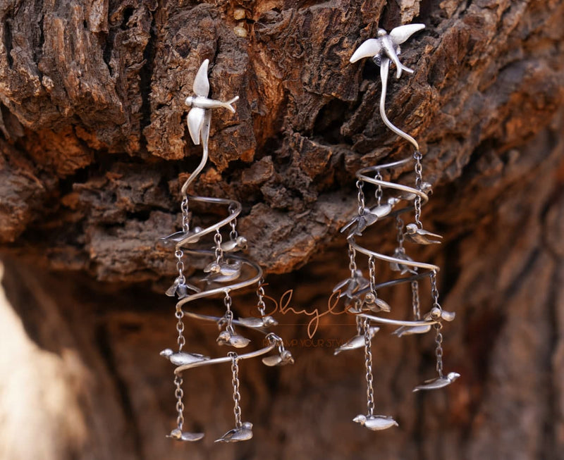 Qurbat Flying Birds Spiral Statement Earring front