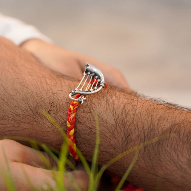 Anvaya Statement Harp Rakhi cum Brooch