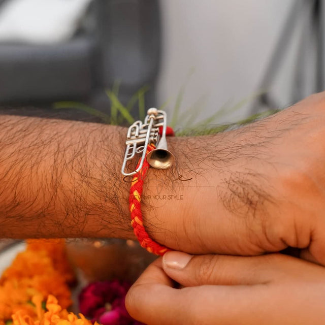 Anvaya Statement Trumphet Rakhi cum Brooch
