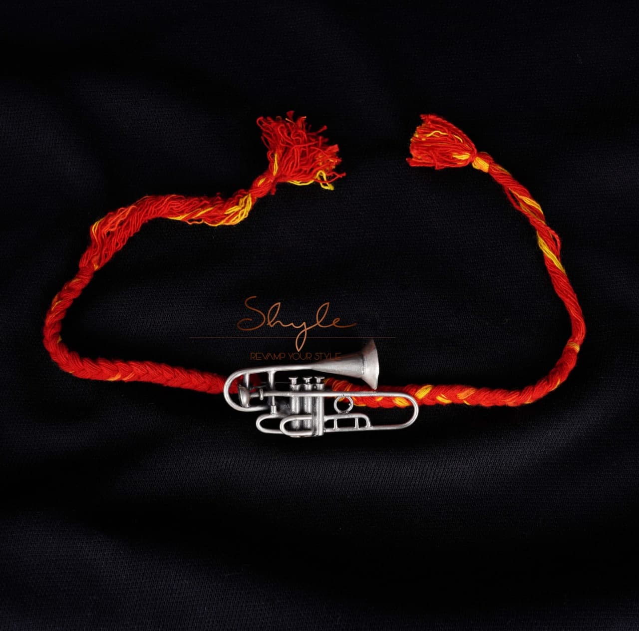 Anvaya Statement Trumphet Rakhi cum Brooch