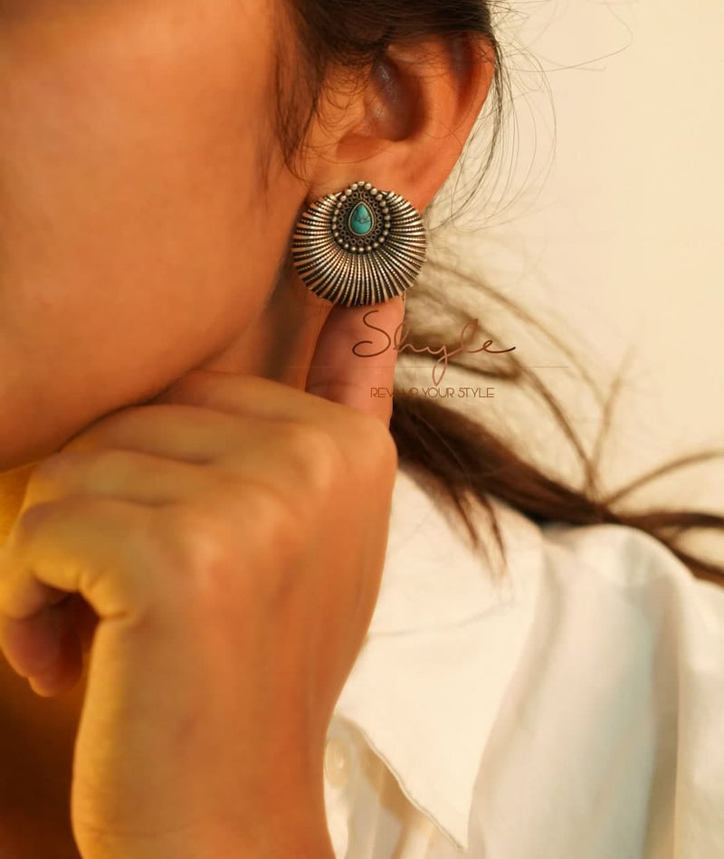 925 pure silver intricate sea shell drop earrings worn on model